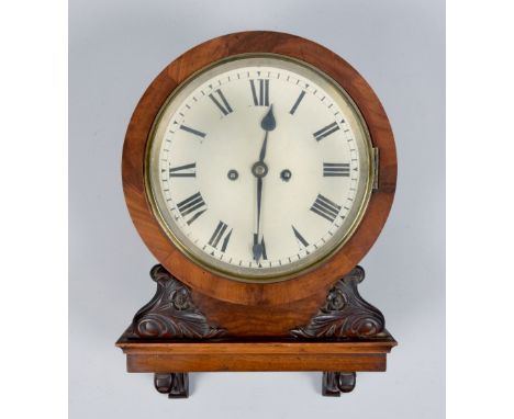 A late 19c English double fusee wall clock in 'Boardroom' type case with built in wall bracket.  The movement is chain driven