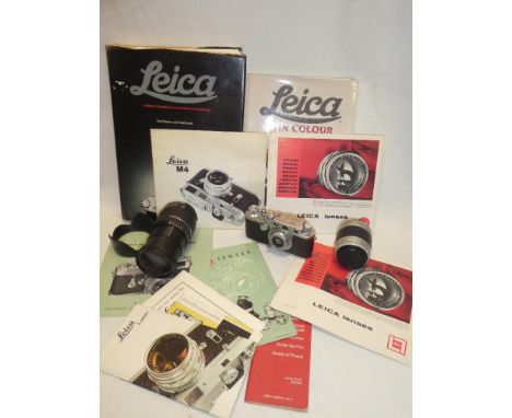 A 1950's Leica 11F camera No. 451337 together with two additional lenses - Tamron and Nikon and a selection of Leica camera a