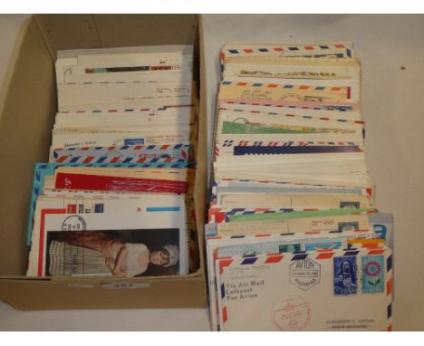 A box containing mixed USA postal covers, German first flight covers and others etc.