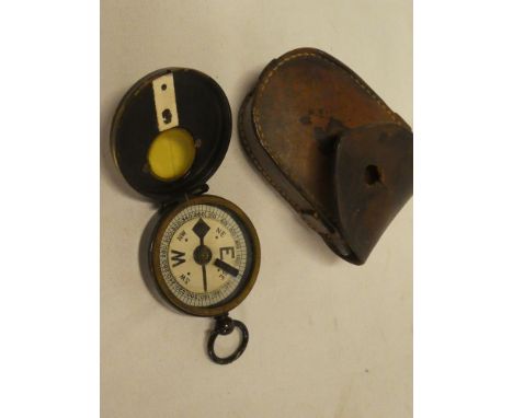 An old military marching compass by Negretti &amp; Zambra of London, the case stamped "C.A. Oliver" in leather carrying case