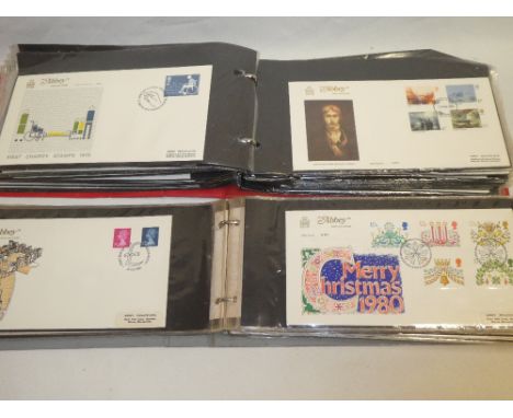 Two albums containing a collection of approximately 150 Abbey first day covers 1960-1980
