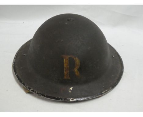 A Second War Home Service steel helmet with "R" emblem for rescue