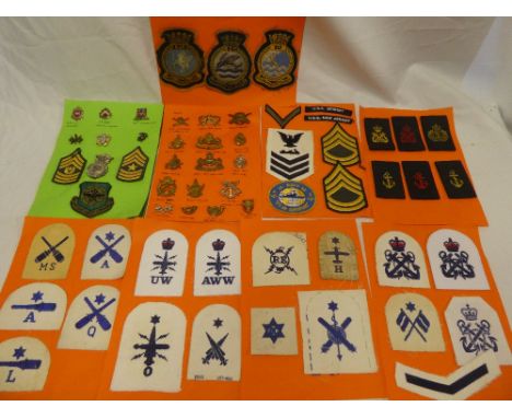 A selection of various Naval and Military badges including Department of Air Force United States of America Security Police b