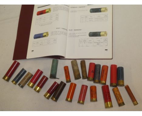 A selection of vintage shotgun cartridge cases including Eley Gas-Tight 10 bore pin fire cartridge; Eley Kynoch 8 bore case, 