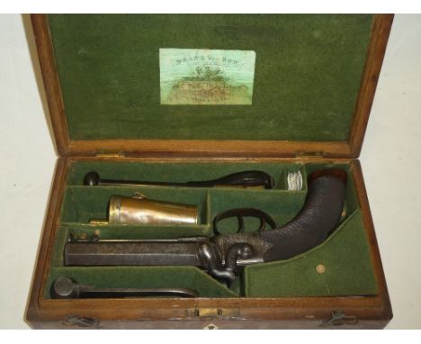 A fine quality 19th century large calibre percussion side-by-side howdah pistol by Moore of London with 5" octagonal steel ba