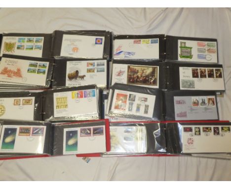 Eight folder albums containing a large collection of over 600 GB, Channel Islands and British Commonwealth first day covers, 
