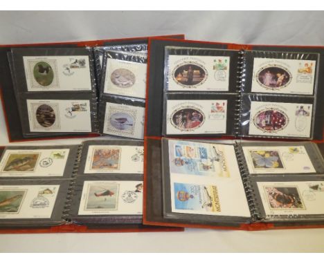 Four albums containing a collection of over 250 Benham silk covers and first day covers 1980-1985