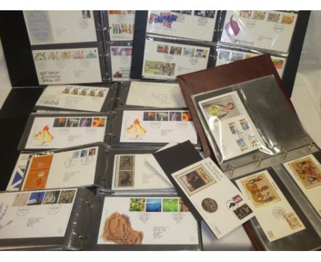 Eight folder albums containing a large collection of GB First Day covers, mainly 1980's/1990's
