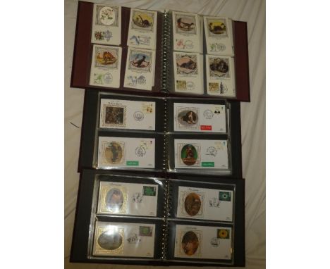 Three folder albums containing a collection of over 250 Benham silk commemorative covers and first day covers mainly 1990s