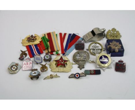 A Small Collection Of Militaria To Include An RAF Cap Badge, A Military Whistle Marked With The Broad Arrow And Dated 1940 An