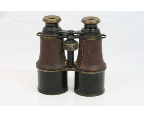A Pair Of World War One Era British Military Issued Field Binoculars With Broad Arrow Markings.