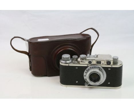 A Vintage Camera Marked Leica D.R.P. Ernst Leitz Wetzlar Luftwaffen - Eigentum No.10794. Complete With Leather Case.