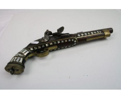 A Antique Middle Eastern Flintlock Pistol With Mother Of Pearl Inlay To Grip And Stock.