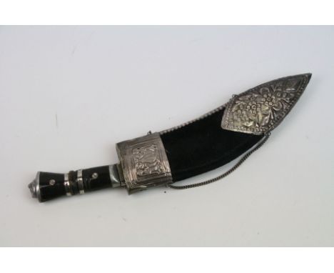 A Gurkha Kukri Knife With Silver Mounted Scabbard.
