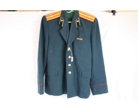 A Vintage Russian / CCCP Majors Tunic Complete With Associated Badges And Medal Bars.