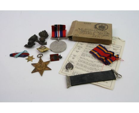 A World War Two Boxed Full Size Burma Star Medal Together With A Small Selection Of Militaria To Include A Full Size World Wa