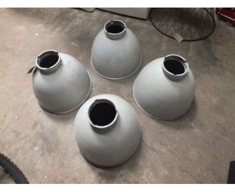 A SET OF FOUR METAL LAMP SHADES