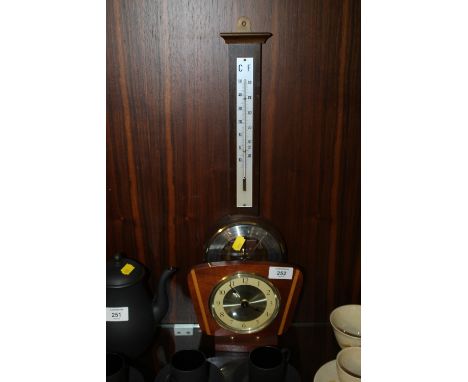 A MODERN SKELETON STYLE BAROMETER TOGETHER WITH A VINTAGE HINDERER CLOCK