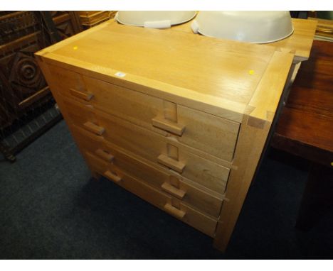 A MODERN LIGHT OAK FOUR DRAWER CHEST