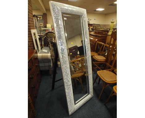 A LARGE FLOOR STANDING MODERN PORTRAIT MIRROR
