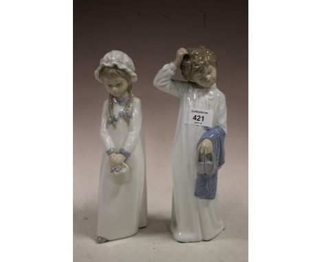 A NAO FIGURE OF A YOUNG BOY TOGETHER WITH A ZAPHIR EXAMPLE