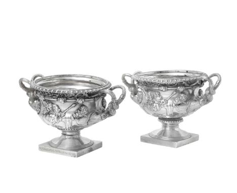 A Pair of George V Silver Copies of the Warwick Vase, by Goldsmiths and Silversmiths Co. Ltd., London, 1910 each of typical f