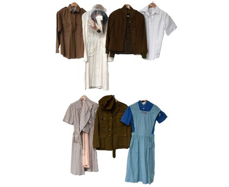 A Collection of Second World War US Army Nurse Corps Uniforms, comprising a seersucker wrap-around dress and two caps, a pair