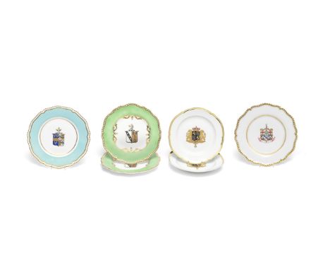 Four English porcelain armorial plates together with a pair of Berlin K.P.M hexafoil armorial platesThe pair of green rimmed 