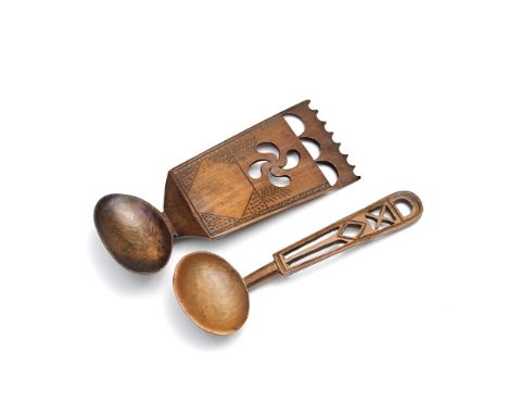 Two Welsh 19th century love spoonsThe first with broad handle chip carved with pierced decoration and ladle type bowl, the se