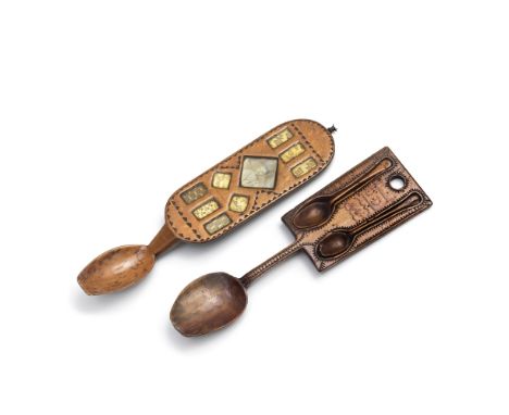 A Welsh 19th century love spoon, together with a late 18th century exampleThe broad handle centred by a photo of a boy, with 