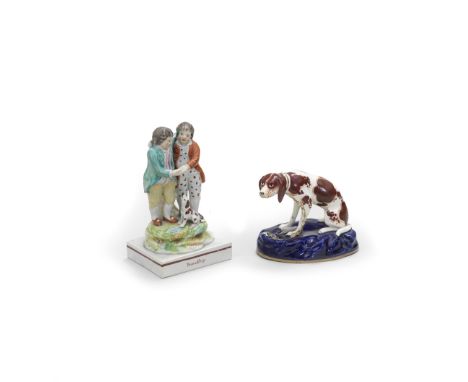 A Staffordshire group of 'Friendship' and a porcelaneous model of a hound, circa 1825-35Two young men embracing, their hands 