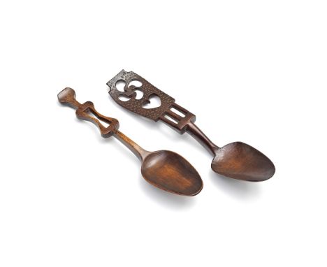 A Welsh late 18th century love spoon, together with anotherThe handle pierced with heart and flower within a chip carved surr