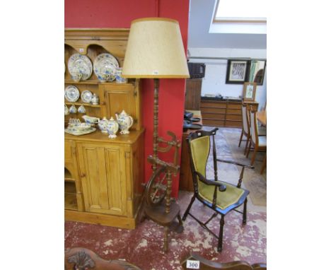 Spinning wheel themed standard lamp