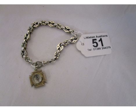 Silver bracelet with compass