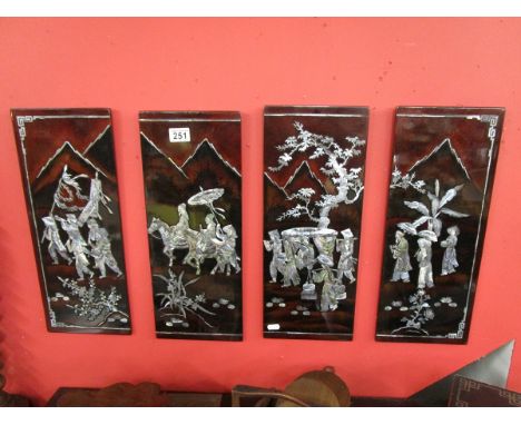 Set of four Oriental mother-of-pearl inlaid plaques.Each approx 48.5cm tall and just over 19cm wide