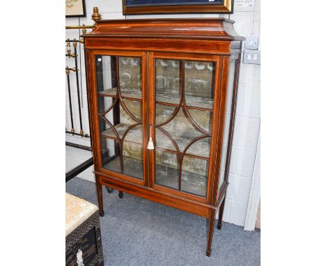 An Edwardian Inlaid and Crossbanded Mahogany Display Cabinet, with caddy top and raised on tapering square section legs, 99cm