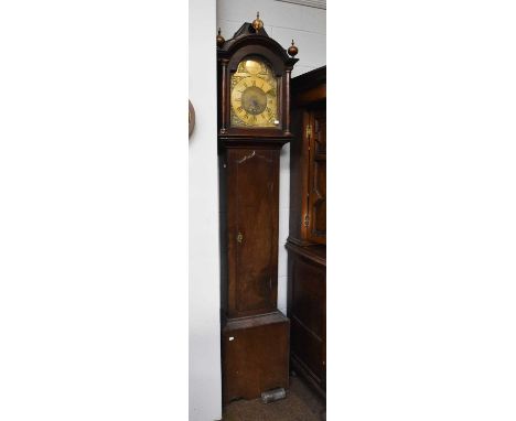 An Oak Thirty-Hour Longcase Clock, circa 1780, the 11" arched brass dial signed on a circular brass disk in the arch Wrangles