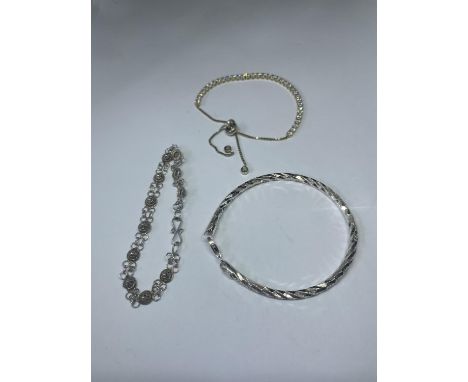 THREE SILVER BRACELETS 