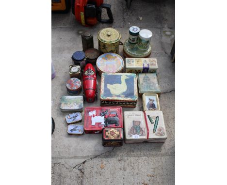 A LARGE ASSORTMENT OF VINTAGE TINS 