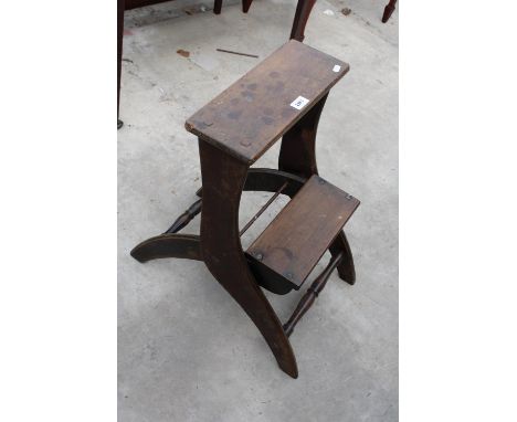 A LATE VICTORIAN FOLDING STEP STOOL BEARING STAMP 'FROM MADAME DE DOMINGUEZ' 