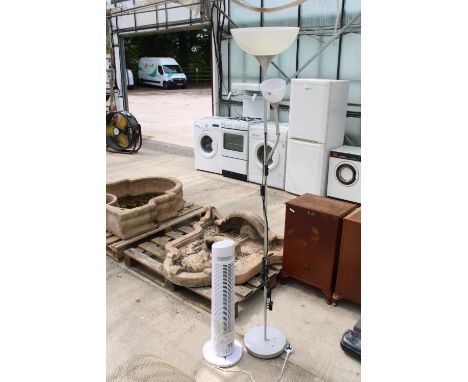 A FLOOR FAN AND A LAMP 