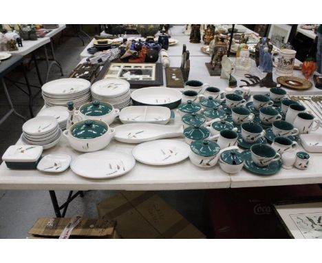 A LARGE QUANTITY OF DENBY GREENWHEAT STONEWARE TO INCLUDE LIDDED SOUP COUPE'S, TEACUPS AND SAUCERS, CRUET SET, LIDDED TUREENS