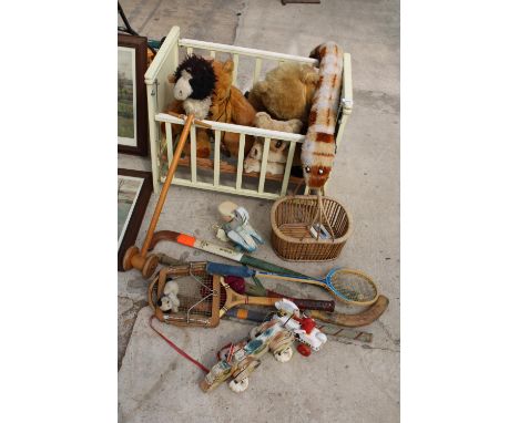 AN ASSORTMENT OF VINTAGE ITEMS TO INCLUDE HOCKEY STICKS, A COT AND TEDDIES ETC 