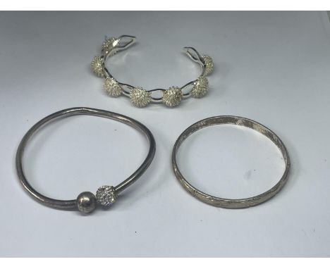 THREE SILVER BANGLES 