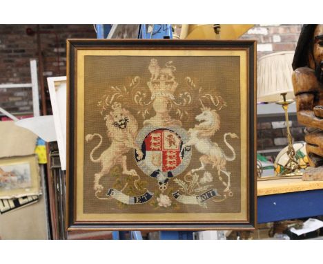 A TAPESTRY OF A CREST, FRAMED 