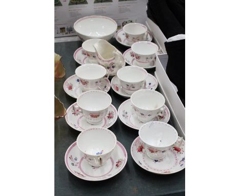 A FLORAL PART TEASET TO INCLUDE CUPS, SAUCERS, LARGE SUGAR BOWL PLUS JUG 