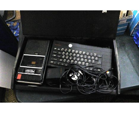 A SINCLAIR ZX SPECTRUM + AND A RADIO SHACK COMPUTER CASSETTE RECORDER IN A CASE 