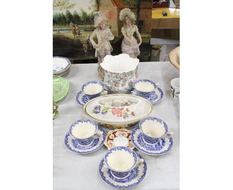 FIVE GEORGE JONES AND SONS, 'CRESCENT' BLUE AND WHITE CUPS AND SAUCERS, A FLORAL PLANTER, A PAIR OF CONTINENTAL FIGURES AND A
