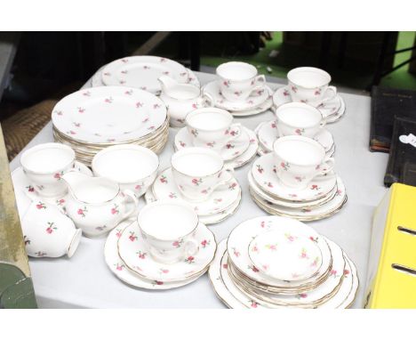 A VINTAGE COLCLOUGH CHINA TEASET, WITH ROSE PATTERN TO INCLUDE PLATES, CREAM JUGS, A SUGAR BOWL, CUPS, SAUCERS AND SIDE PLATE