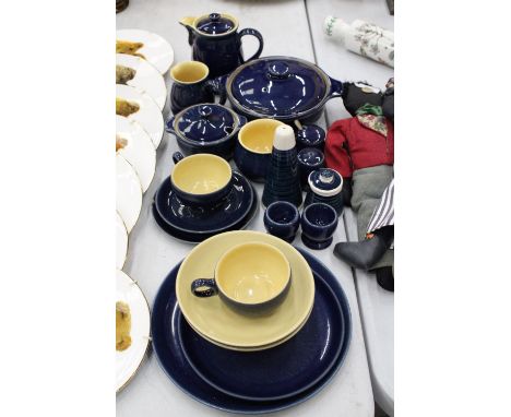 A QUANTITY OF DENBY COBALT BLUE STONEWARE TO INCLUDE A COFFEEPOT, LIDDED TUREEN, CUPS AND SAUCERS, MILK JUG, ETC., 